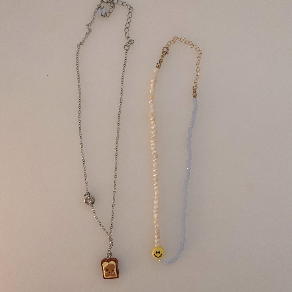 2 Pack Toast And Beaded Necklaces 8$